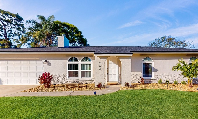 Palm Bay Casa | Snowbird-friendly home with open layout, enclosed yard, smart TV, AC, & W/D