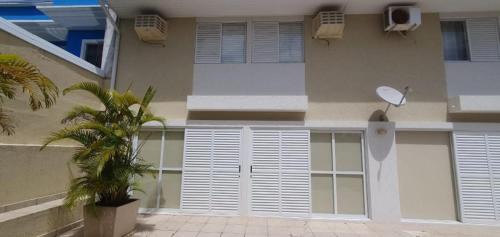 Guaratuba Casa | Sobrado aconchegante com Piscina Ar Condicionado 3 quartos a 150 metros do mar no Brejatuba