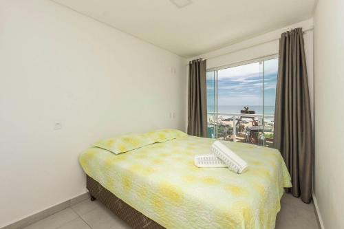 Canto Grande Apartamento | Sobrado frente ao mar Mariscal 4 Pessoas