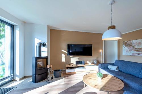 Krakow am See Apartamento | Sonnengruß - Stilvolles Apartment mit Balkon, Kamin & Wellness-Flair am Krakower See