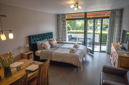 Sudrandweg Apartamento | Sonnenstube - Westbalkon, Ruhige Lage, Sauna, Pool, Seenähe, Dachterrasse