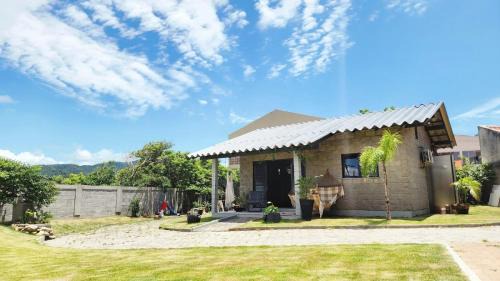 Pantano do Sul Casa | Sossego e pé na areia no Sul da Ilha