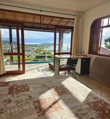 Caiacanga Apartamento | Sossego, Linda vista, praia 400mts e home-office