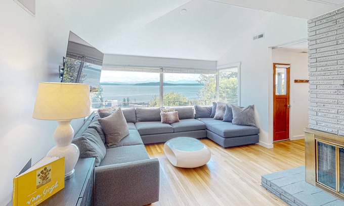 Alki Casa | Sound view home with large patio, private putting green & amazing setting