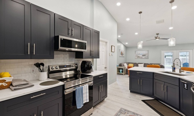 Palm Bay Casa | Spacious 4 bedroom, 2000 sq ft home with parking on premise.