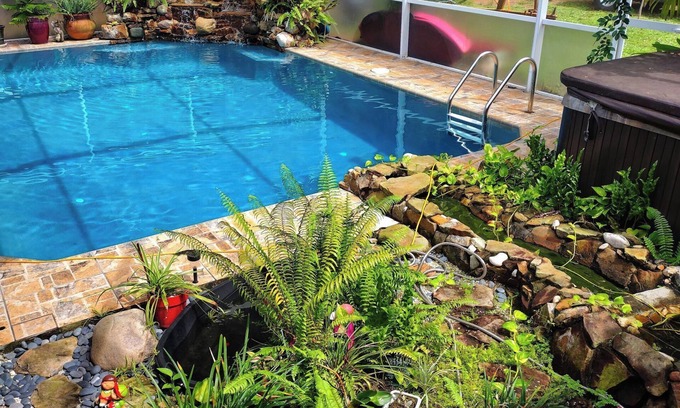 Port Saint Lucie Casa | Spacious 5-bedroom Estate Home with a country club back porch pool & waterfall
