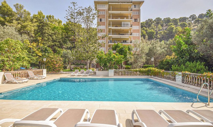 Puerto de Soller Apartamento | Acogedor apartamento con piscina comunitaria e impresionantes vistas al mar