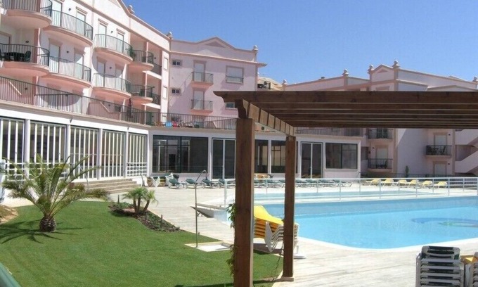 Luz Apartamento | Amplio departamento. Enorme balcón con vistas a piscinas y jardines. Wi-Fi gratis. 3071 / AL
