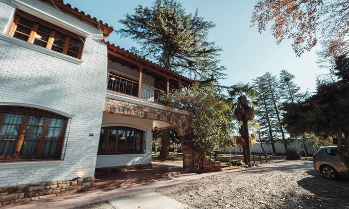 Chacras de Coria Chalet De Esquí | Spacious chalet with 9 bedroom,AC, WiFi, pool, 8000m2 park in Chacras de Coria