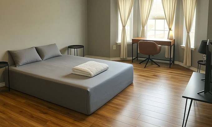 Braithwaite Casa | Spacious comfortable King room. Work-friendly. High-speed internet w/ 50" TVs