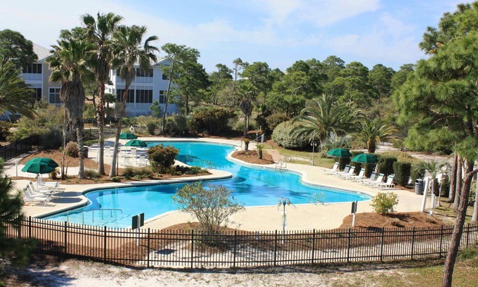Plantation Casa | Spacious dog-friendly home with elevator, screened decks, on-site pool, & gym
