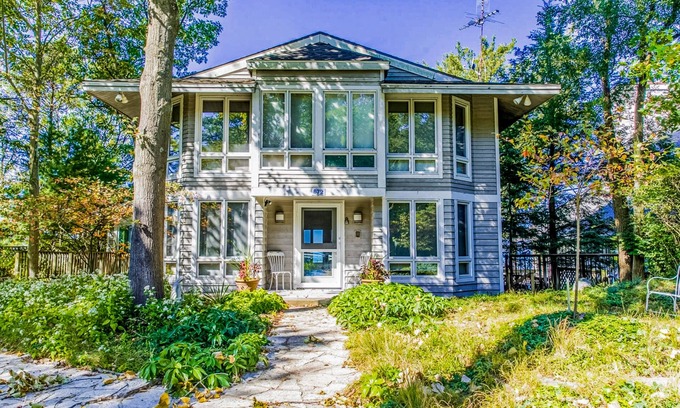 Shorewood-Tower Hills-Harbert Casa | Spacious lakefront home with private beach, hot tub, fire table, & views