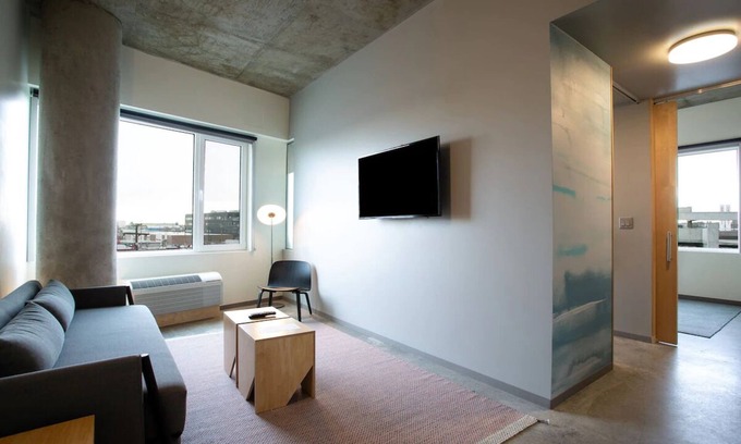 River North Art District Hotel | Spacious Suite with Stunning Market Views, Chic Decor, and Modern Amenities