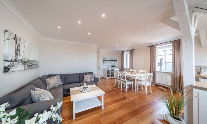 Westermarkelsdorf Apartamento | Elegante apartamento en el mar Báltico con un toque de isla y un hermoso jardín cercado