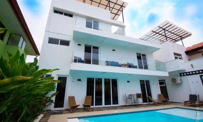 Playa Hermosa Casa | Steps from beach with private pool, rooftop terrace & swim up bar beach club!
