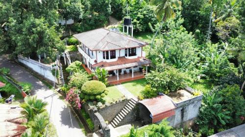 Harispattuwa Casa | Stone Arch Villa A Timeless Retreat with a Free Kandy Lake Boat Tour