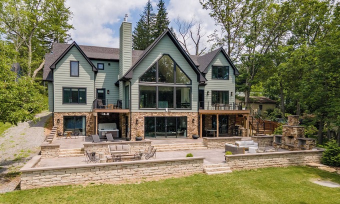 McHenry Casa | Stone Manor: Lakefront, 2 Hot Tubs, Private Indoor Pool!