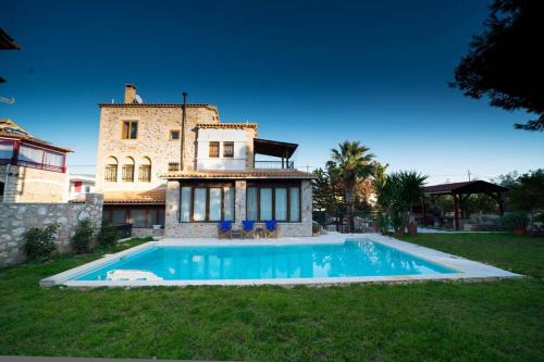 Saronikos Villa | Stone Villa Lagonisi