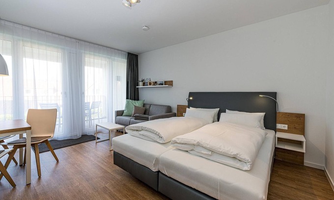 Bensersiel Apartamento | Strandnahes 1-zimmer Apartment mit Balkon, Parkplatz, Schwimmbad- & Saunanutzung