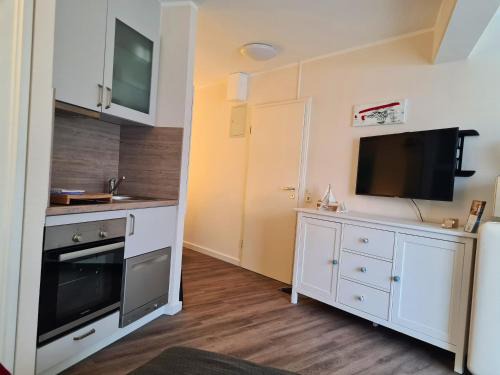 Juist Apartamento | Strandburg Juist Apartment 208 - Schwimmbad und Sauna kostenfrei
