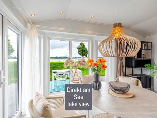 Lathum Casa | Strandperle Lathum Ferienhaus in Premium Lage am See für Urlaub und Workation mit Hundestrand