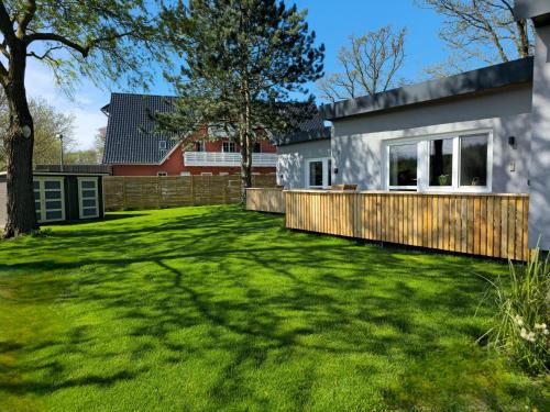 Graal Mueritz Apartamento | "Strandvergnügen", 100 m zum Traumstrand, ganzer Terrassen-Bungalow mit Parken