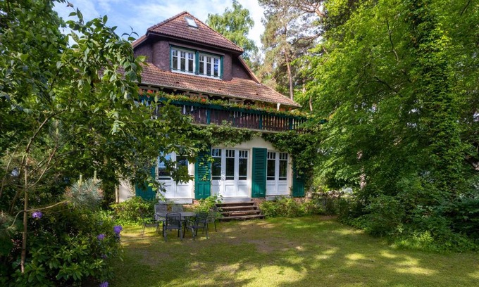 Boltenhagen Apartamento | Strandvilla Hubertus Boltenhagen - Ferienwohnung Maisonette Apartment Kandinsky mit seitlichem Meerblick Parkplatz WLAN voll ausgestattete Küche Garten Grillplatz Waldbaden Familie Südlage