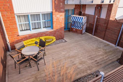 Schonberger Strand Apartamento | Strandwohnung mit großer Terrasse in erster Reihe am Schönberger Strand, Kajak, Wallbox, 24h self check-in, DisneyPlus