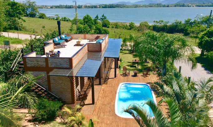 Ibiraquera Apartamento | Estudio Mar, Tierra y Lagoa. Un pedacito del paraíso está bien aquí. ¡Venga a disfrutar!
