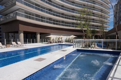 Pompeia Apartamento | Studio moderno em condomínio de luxo pé na areia