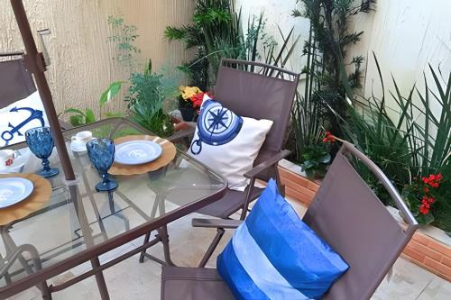 Centro Casa | Studio pé na areia com área de churrasco privativa