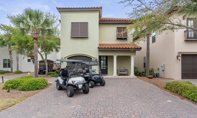 Villa Lago Casa | Stunning 4BR Beach Villa! 2 GOLF CARTS. Steps to Pool. Beach Tram. Near Wharf