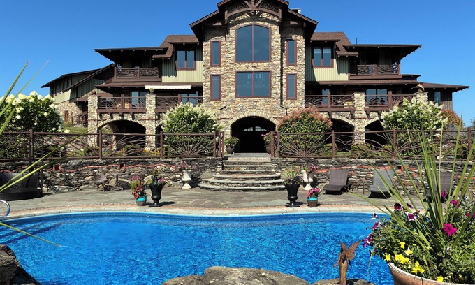 Pleasant Valley Cabina | Stunning Modern Artistically Crafted Lodge. 50 pristine acres with 9ac pond/pool