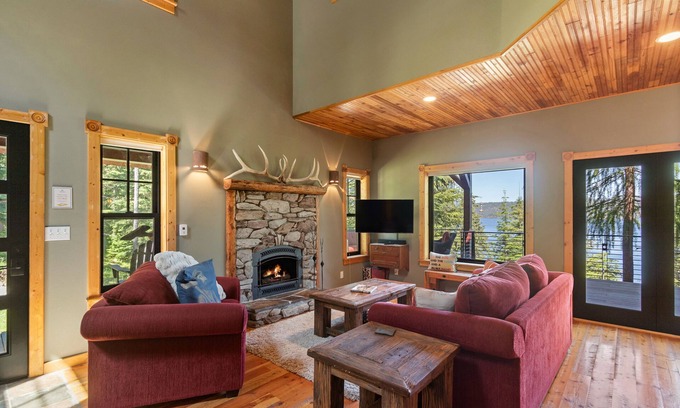 Coeur d'Alene Casa | Stunning mountain escape with lake views, expansive furnished deck & firepit - dog-friendly