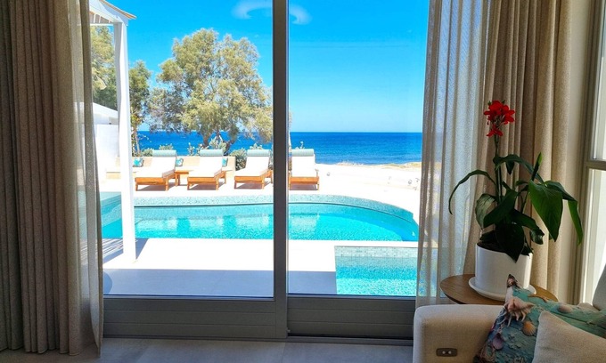 Monolithos Villa | Stunning Seafront Santorini Villa | Villa Aether | 2 Bedrooms | Private Outdoor Heated Pool & Hot Tub | Breathtaking Sea Views | Monolithos