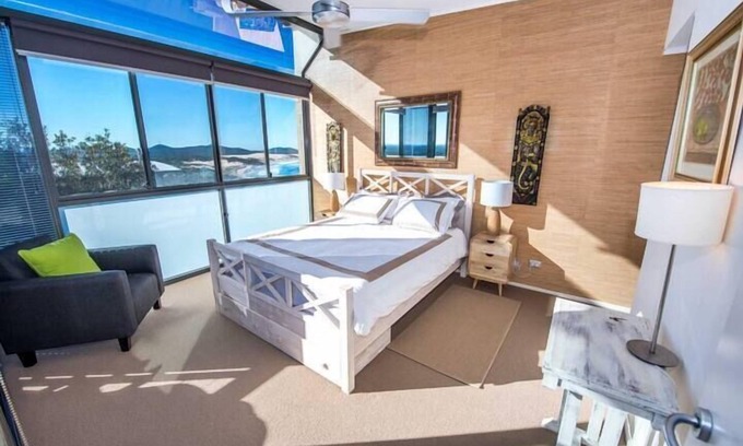 Boat Harbour Apartamento | Stunning views sunrise to sunset - walk to beach - shared pool/spa