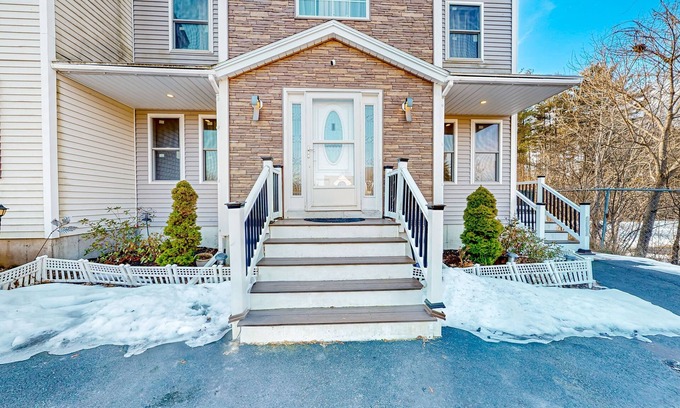 Westbrook Condominio | Stylish condo with a high-end kitchen, washer/dryer, & large yard