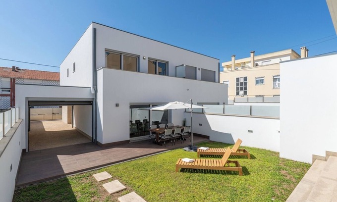Senhora da Hora Casa | Stylish Home w/ Garage and Terrace by HostWise