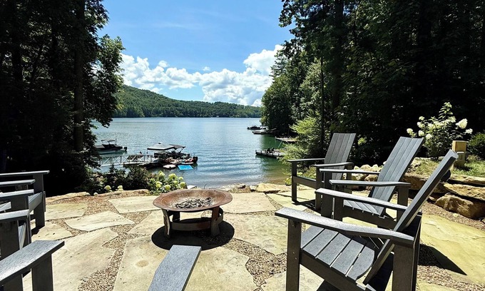 Cullowhee Casa | Stylish lakefront home with large flat yard, boat dock, hot tub & mountain view!