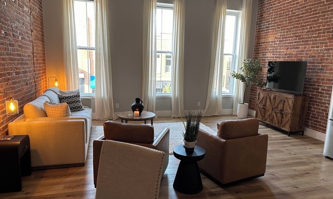 Warsaw Apartamento | Stylish & Modern 2-Bdrm Apt in Downtown Warsaw featuring an urban rooftop deck.