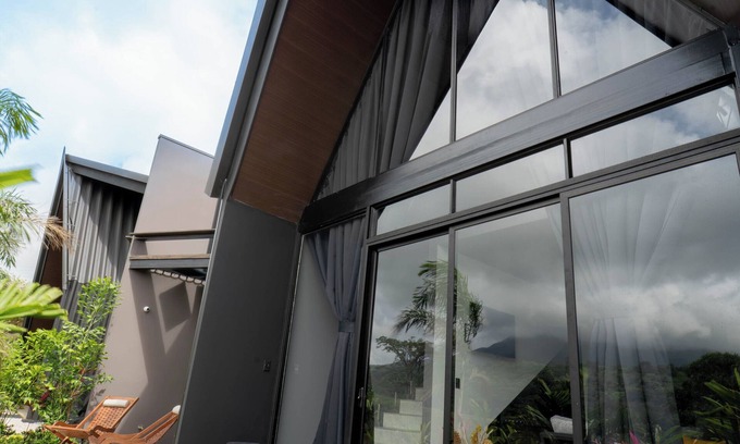 Aguas termales de Arenal Cabina | Stylish New Escape Cabin w/hot tub Volcano view