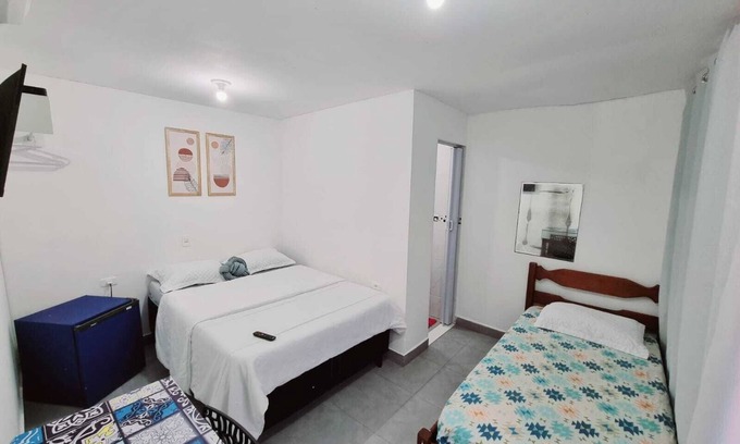 Taio Apartamento | Suíte Privativa Praia dos Anjos