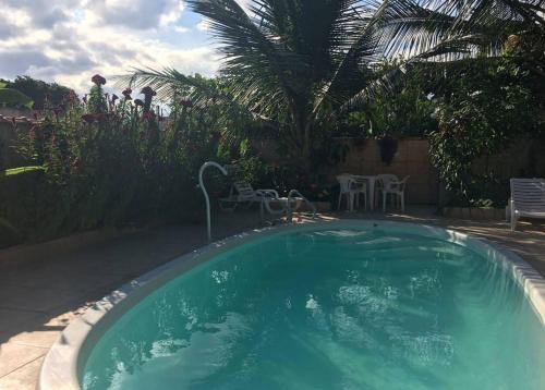 Bairro da Enseada Casa | Suíte 1 com piscina e wi-fi em Caraguatatuba