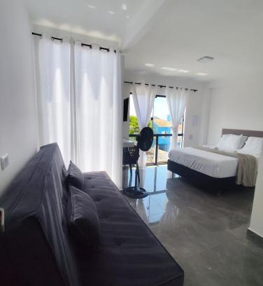 Praia de Leste Casa | Suíte 25 família Praia de Leste