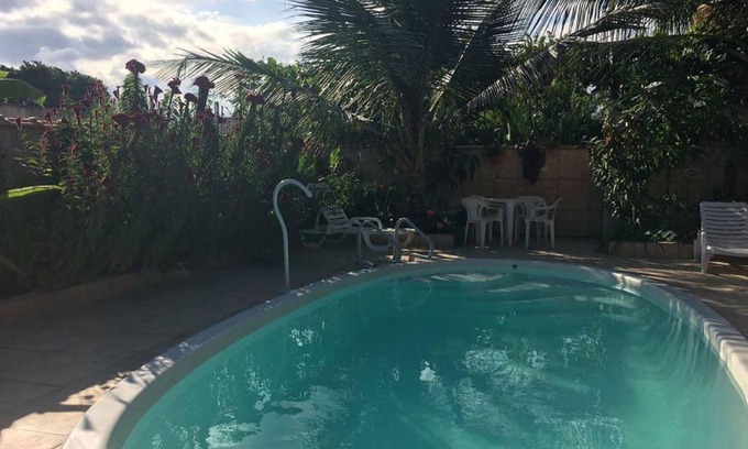 Bairro da Enseada Casa | Suíte 6 com piscina e wi-fi em Caraguatatuba