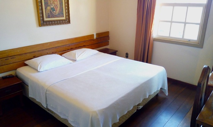 Ouro Preto Apartamento | Suíte com Vista Para a Montanha