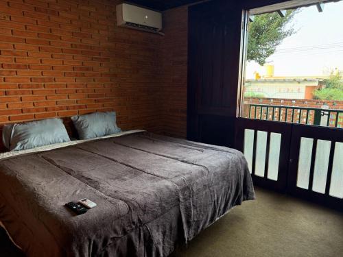 Botucatu Casa | Suíte king com ar condicionado