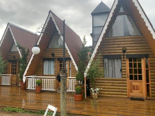 Jardim Nova Suica Cabina | Suítes no Chalé - Cabanas