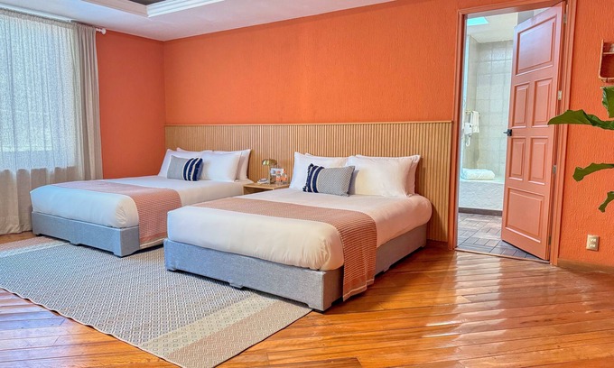 Del Carmen Hotel | Suite Deluxe Doble Queen - 04