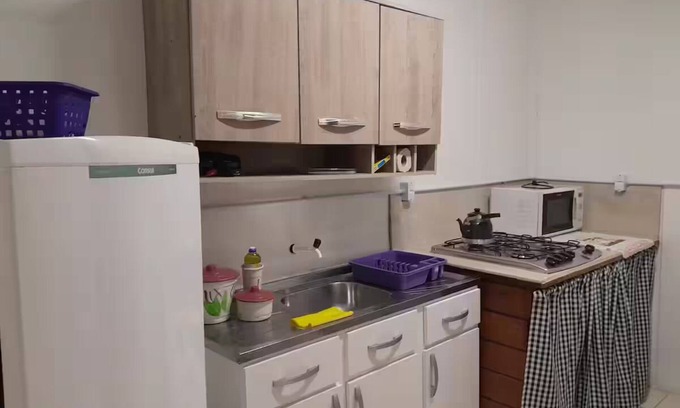 Cidade Nova Apartamento | suite+kitchen twelve with air conditioning